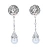 Boucles d'oreilles en or blanc perles et diamants