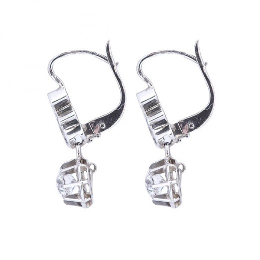 Boucles d'oreilles " dormeuses" en or blanc et pierre du rhin