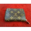 Porte-monnaie Louis Vuitton Zippy en toile monogram