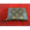 Porte-monnaie Louis Vuitton Zippy en toile monogram