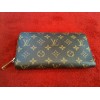 Portefeuille Louis Vuitton Zippy en toile monogram 