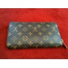 Portefeuille Louis Vuitton Zippy en toile monogram 