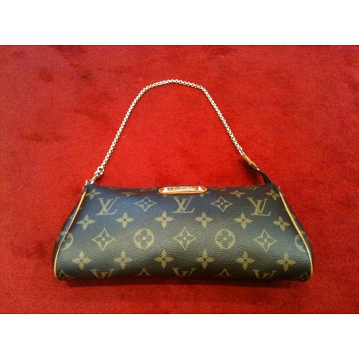 Pochette Louis Vuitton Eva en toile monogram