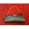 Pochette Louis Vuitton Eva en toile monogram