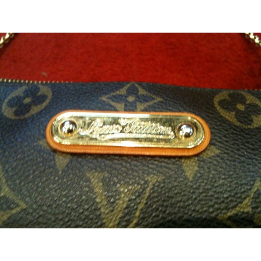 Pochette Louis Vuitton Eva en toile monogram