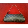 Pochette Louis Vuitton Eva en toile monogram