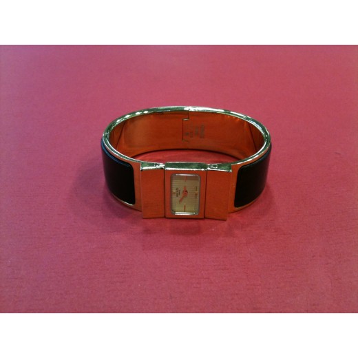 Montre Hermès Clic-Clac en bois et plaqué or