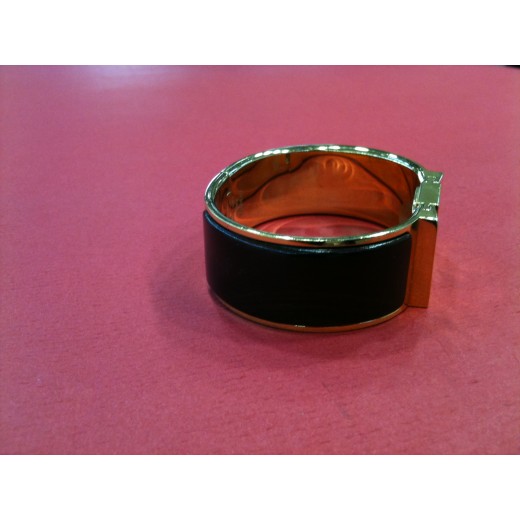 Montre Hermès Clic-Clac en bois et plaqué or