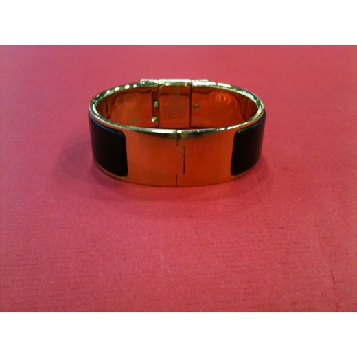Montre Hermès Clic-Clac en bois et plaqué or