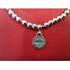 Bracelet Tiffany & CoPlaque ronde mini en argent