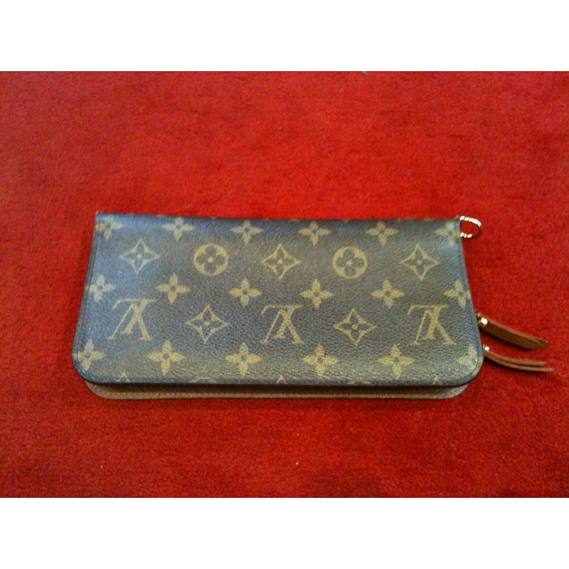 Porte-monnaie et portefeuilles Louis Vuitton en cuir pour femme