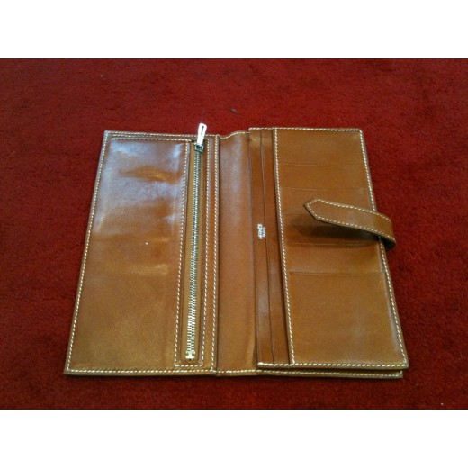 Portefeuille Hermès Béarn en cuir gold