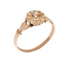Bague surmontée d'un diamant et de petites perles