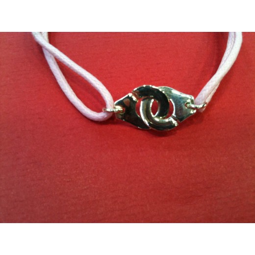 Bracelet Dinh Van Menottes R12 en argent sur cordon