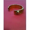 Bracelet Hermès en cuir et plaqué or