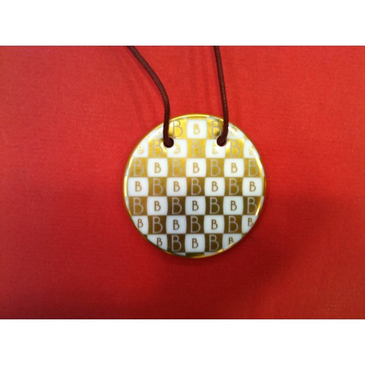 Pendentif Bernardaud Gong en porcelaine