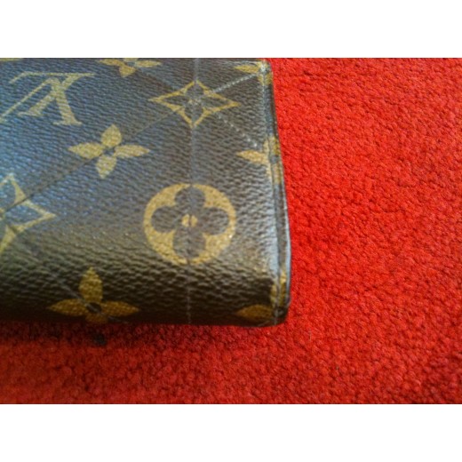 Portefeuille Louis Vuitton Compact Wallet en toile monogram étoile