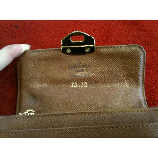 Portefeuille Louis Vuitton Compact Wallet en toile monogram étoile