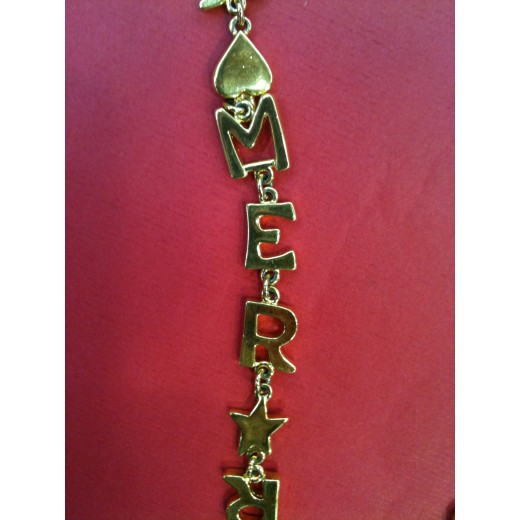 Collier Yves Saint Laurent en métal doré