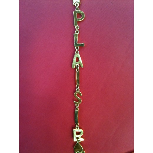 Collier Yves Saint Laurent en métal doré