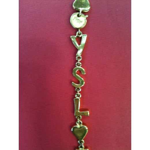 Collier Yves Saint Laurent en métal doré