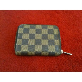 Porte-monnaie Louis Vuitton Zippy en toile damier ébène