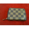 Porte-monnaie Louis Vuitton Zippy en toile damier ébène