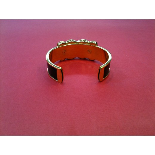 Bracelet Hermès en cuir noir et plaqué or