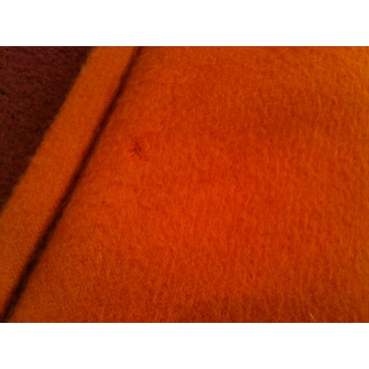 Cape Hermès en cachmire orange et franges en cuir