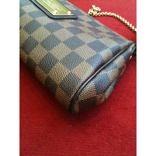 Pochette Louis Vuitton Eva en toile damier