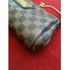 Pochette Louis Vuitton Eva en toile damier