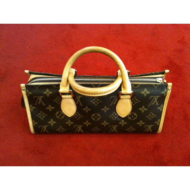 LOUIS VUITTON. Monogram Popincourt. Sac en toile monogra…