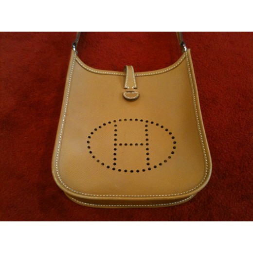 Pochette Hermès evelyne en cuir gold