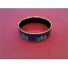 Bracelet Hermès en émail et plaqué or
