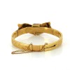 Bracelet en or jaune avec noeud en email