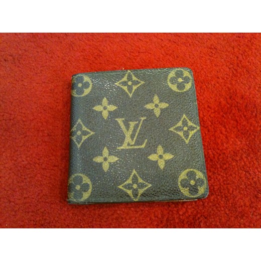 Porte-billet Louis Vuitton en toile monogram.