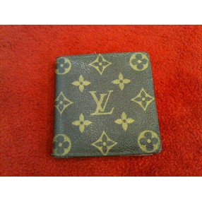 Porte-billet Louis Vuitton en toile monogram.