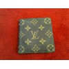 Porte-billet Louis Vuitton en toile monogram.