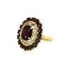 Bague en or jaune 18 k et pierres bordeaux