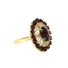 Bague en or jaune 18 k et pierres bordeaux