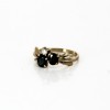 Bague moderne en or jaune 18 k pierres noires