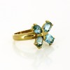 Bague en or jaune 18 k et pierres bleues