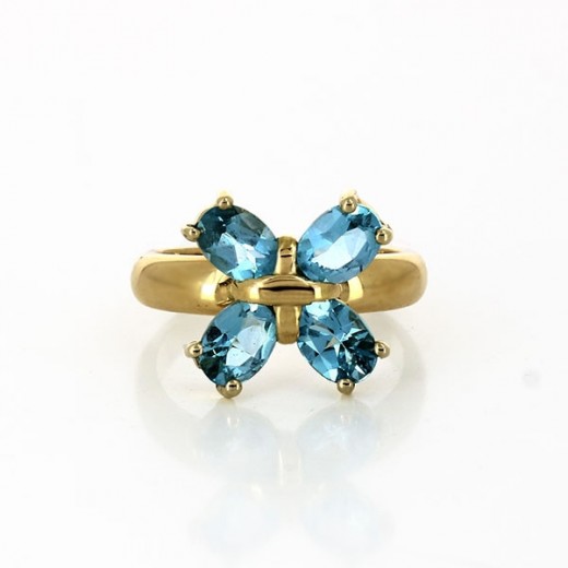 Bague en or jaune 18 k et pierres bleues