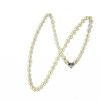 Collier perles de culture en choker et fermoir noeud en diamants