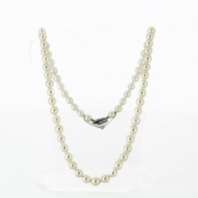 Collier perles de culture en choker et fermoir noeud en diamants