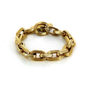 Bracelet Yves Saint Laurent en métal doré