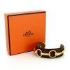 Bracelet Hermès en cuir de lézard et plaqué or