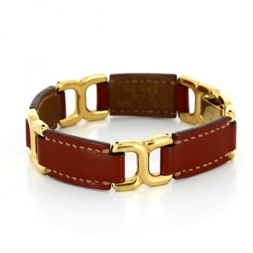 Bracelet Hermès en cuir et plaqué or