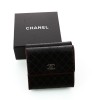 Petit portefeuille Chanel en cuir noir