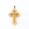 Pendentif croix orné de turquoises en or jaune 8k